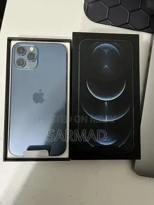 Photo - Pristine iPhone 12 Pro Blue Smartphone with Original Box