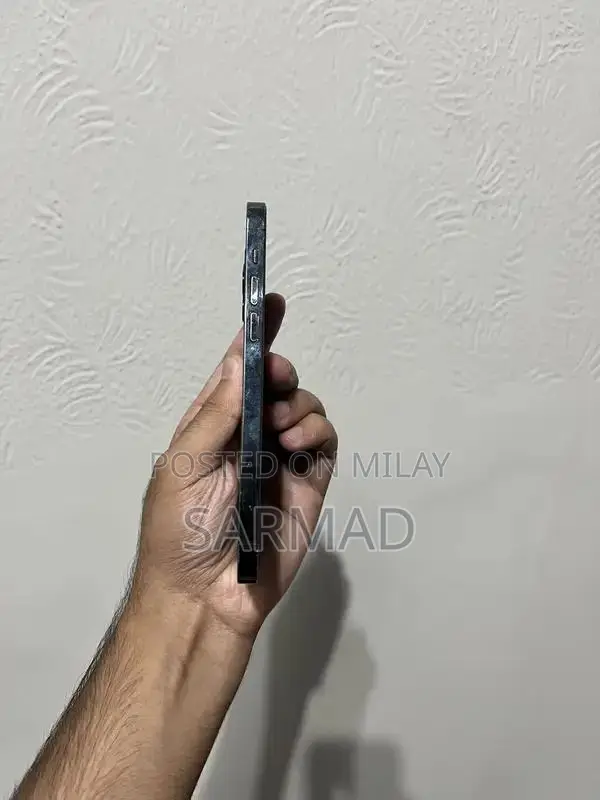 Pristine iPhone 12 Pro Blue Smartphone with Original Box