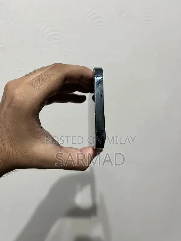 Pristine iPhone 12 Pro Blue Smartphone with Original Box