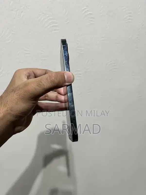 Pristine iPhone 12 Pro Blue Smartphone with Original Box