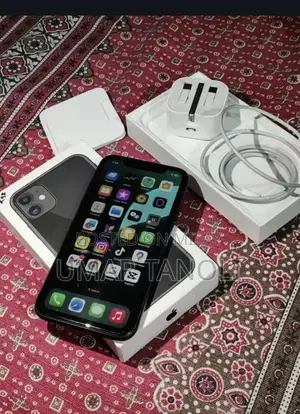 Photo - Apple iPhone 11 64GB Smartphone with Original Accessories