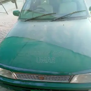 Photo - Toyota Corolla XLI Sedan - Low Mileage Import