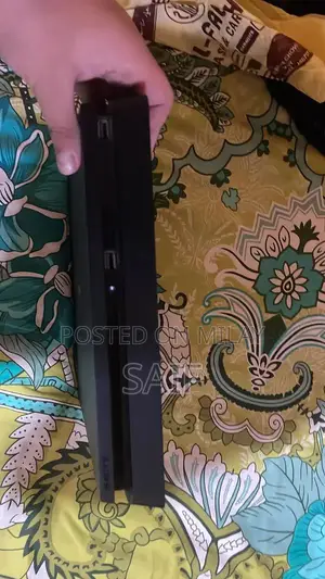 PlayStation 4 Slim 1TB Gaming Console with Controller and Games