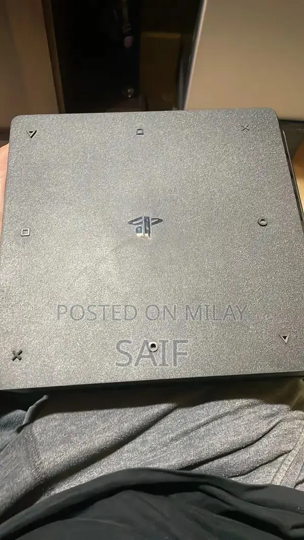 PlayStation 4 Slim 1TB Gaming Console with Controller and Games