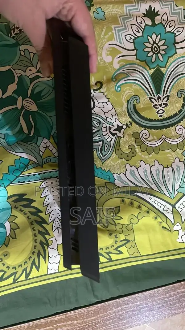 PlayStation 4 Slim 1TB Gaming Console with Controller and Games