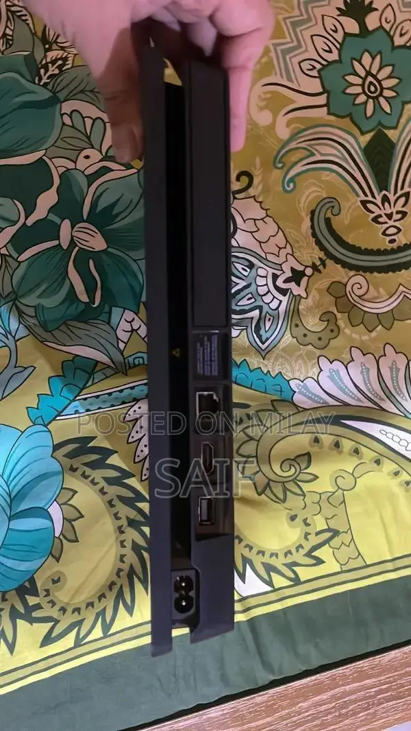 PlayStation 4 Slim 1TB Gaming Console with Controller and Games