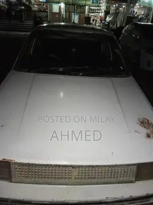 Photo - Toyota Corolla E80 Sedan - Classic 1986 White Model