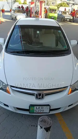 Photo - Used Car: 2 Keys, Well-Maintained, Ready to Drive