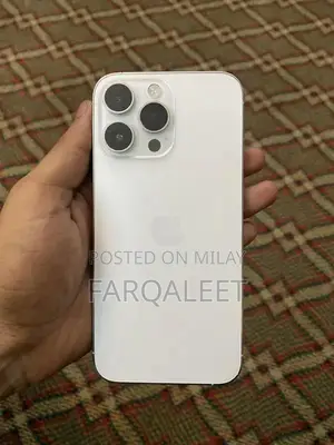 Photo - Apple iPhone 14 Pro Max 1TB Starlight Smartphone