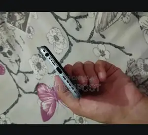 Photo - Budget Smartphone with Quad Camera and Slim Design