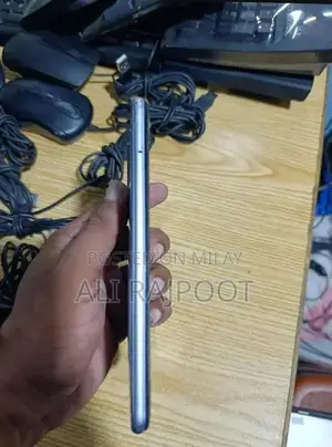 Budget Smartphone with Quad Camera and Slim Design