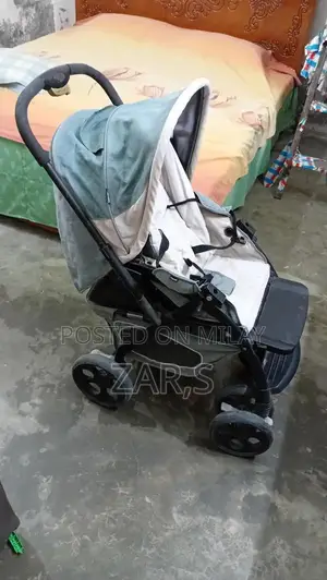 Photo - Foldable 4-Wheel Baby Pram in New Condition