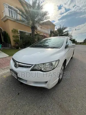 Photo - 2012 Honda Civic UG - White Sedan, Low Mileage