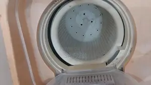 Photo - Super Asia Washing Machine with Built-in Dryer Function