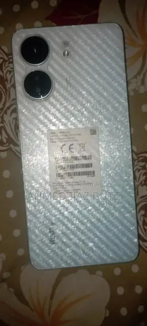 Photo - Redmi 13C Smartphone - Excellent Condition with Original Accessories