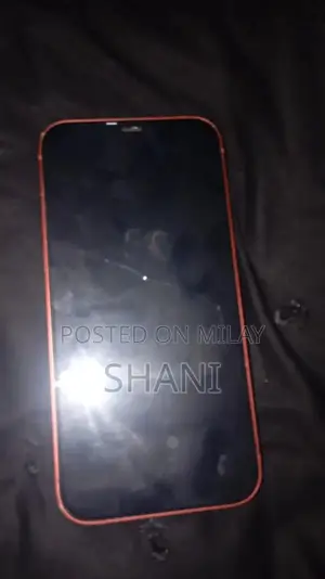 Photo - Apple iPhone 12 Pre-Owned Smartphone with Minor Screen Damage