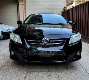 Photo - Toyota Corolla SR Sedan - Well-Maintained Reliable Car