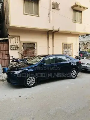 Photo - Toyota Corolla GLI Automatic Sedan - Low Mileage Luxury Edition