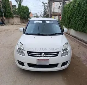 Photo - Suzuki Swift 2018 Automatic White Sedan