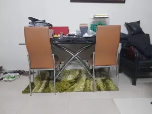 Photo - Elegant Steel Dining Table Set with 8 Chairs