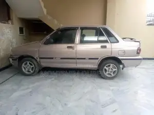 Photo - 2003 Kia Classic Sedan - Well-Maintained Reliable Vehicle