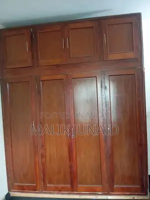 Photo - Large Diyar Wood Ceiling Height Wardrobe with Multiple Compartments