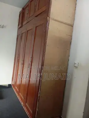 Large Diyar Wood Ceiling Height Wardrobe with Multiple Compartments