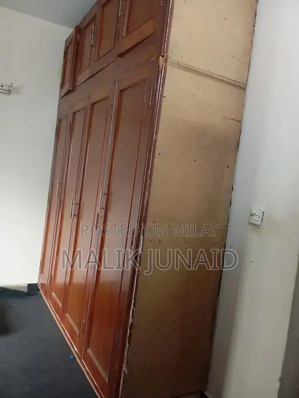 Large Diyar Wood Ceiling Height Wardrobe with Multiple Compartments