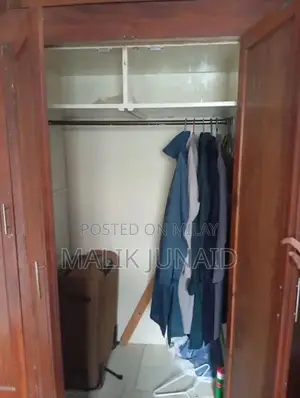 Large Diyar Wood Ceiling Height Wardrobe with Multiple Compartments