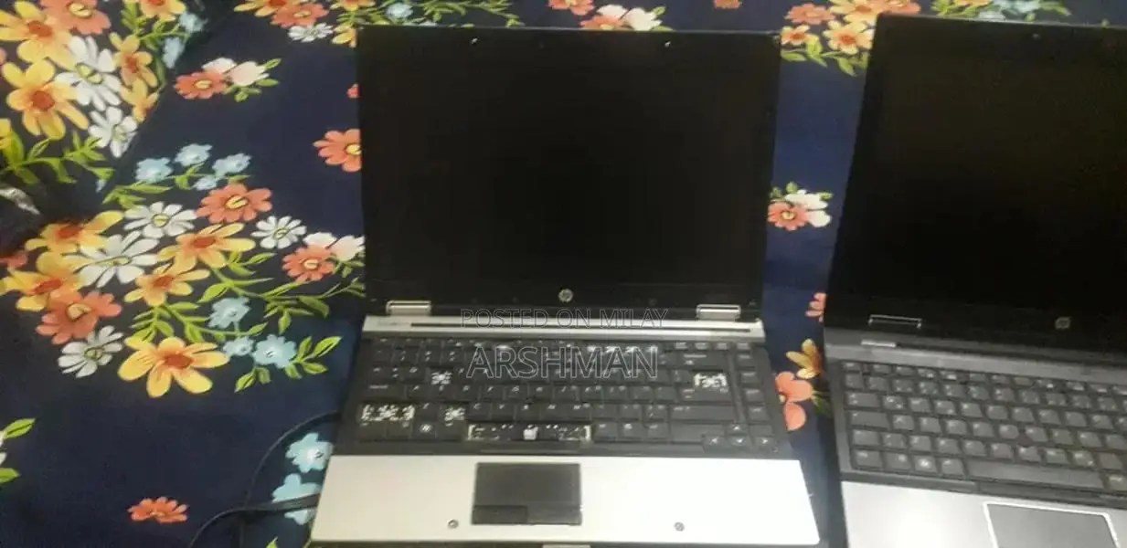 2 Used Laptops Bundle: Black Linux Laptop + White Laptop (Chargers Inc