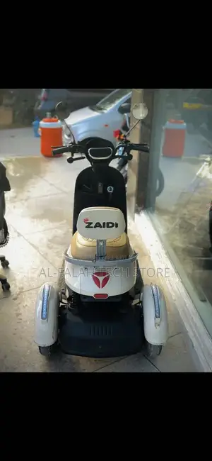 Photo - Metro A7 Electric Scooter - Cream White, Low Mileage