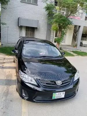 Photo - Toyota Corolla XLI 1.3 VVTi Sedan - Black Manual Transmission