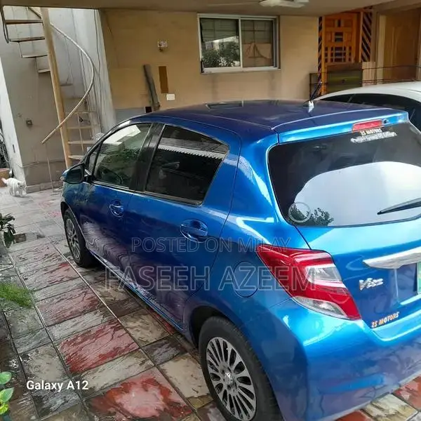 Blue Toyota Vitz Compact Family Car with Dash Cam