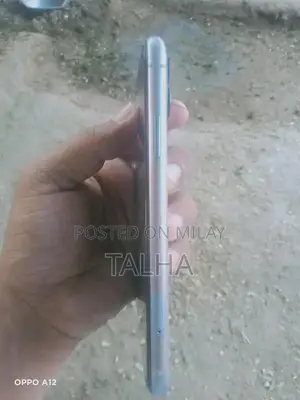 Pre-owned Apple Smartphone with Original Accessories