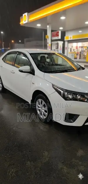 Photo - Toyota Corolla GLI Sedan - Well-Maintained 2015 Model