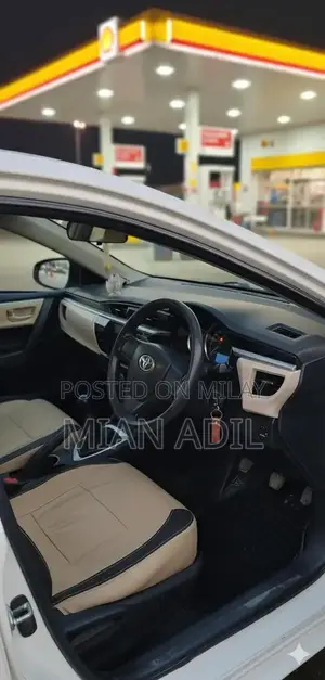 Toyota Corolla GLI Sedan - Well-Maintained 2015 Model