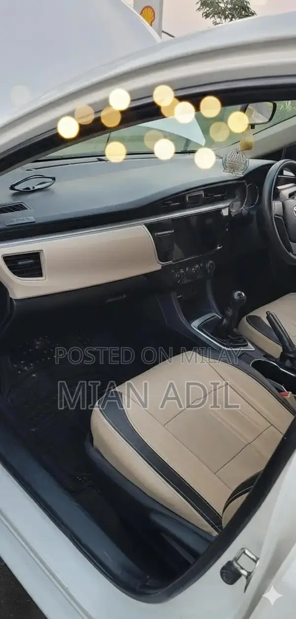 Toyota Corolla GLI Sedan - Well-Maintained 2015 Model