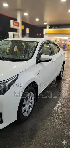 Toyota Corolla GLI Sedan - Well-Maintained 2015 Model