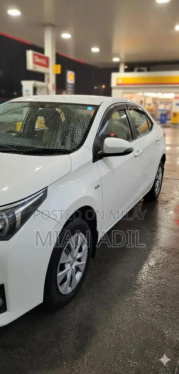 Toyota Corolla GLI Sedan - Well-Maintained 2015 Model