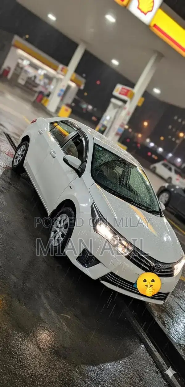 Toyota Corolla GLI Sedan - Well-Maintained 2015 Model