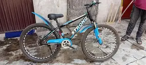 Blue and Black Fat Tire Bicycle with Front Suspension