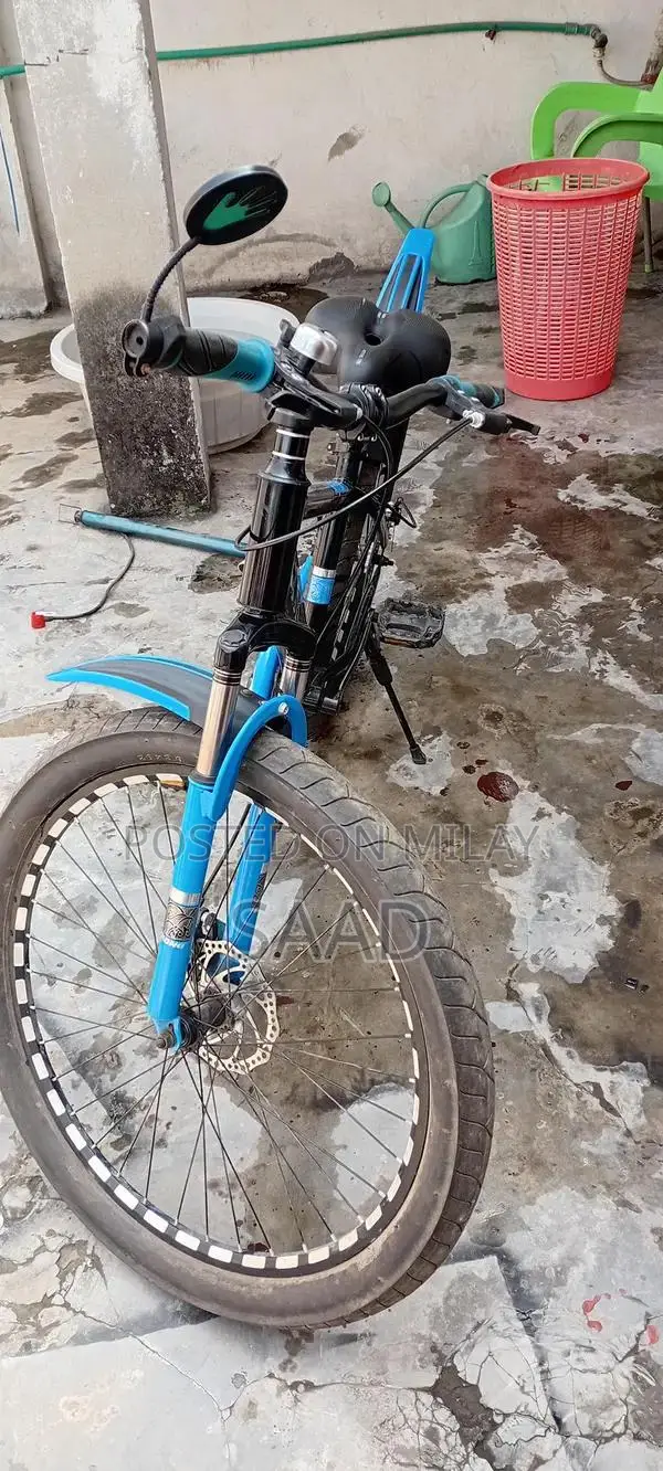 Blue and Black Fat Tire Bicycle with Front Suspension