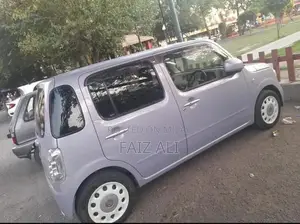 Mira Cocoa Compact Hatchback - Low Mileage Fuel Efficient Car