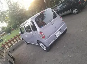 Mira Cocoa Compact Hatchback - Low Mileage Fuel Efficient Car