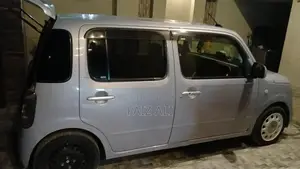 Mira Cocoa Compact Hatchback - Low Mileage Fuel Efficient Car