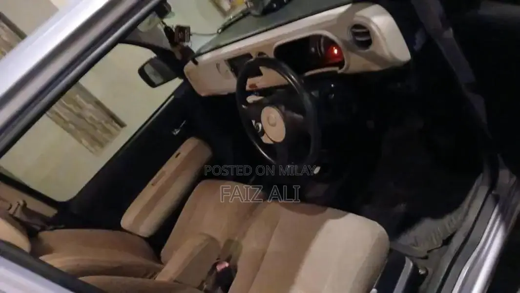 Mira Cocoa Compact Hatchback - Low Mileage Fuel Efficient Car