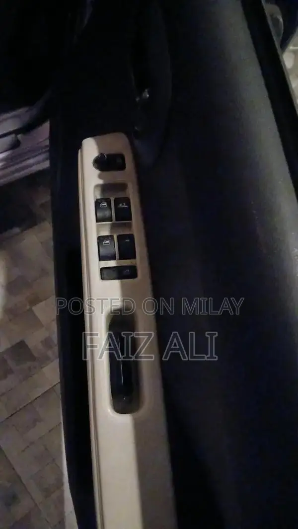 Mira Cocoa Compact Hatchback - Low Mileage Fuel Efficient Car