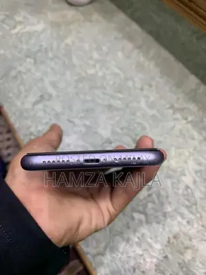 Photo - Apple iPhone 11 64GB Purple Smartphone