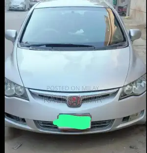 Photo - 2006 Honda Civic Sedan - Manual Transmission Compact Car