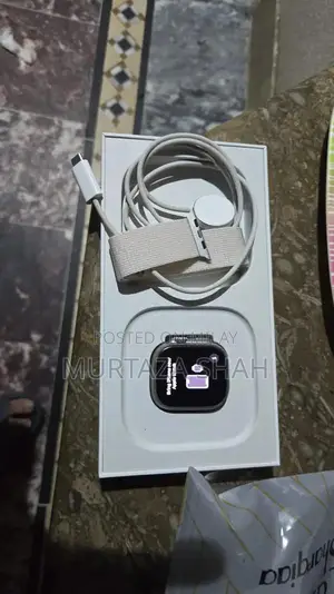 Photo - Apple Watch Ultra 49mm GPS Titanium Case with Dual Bands